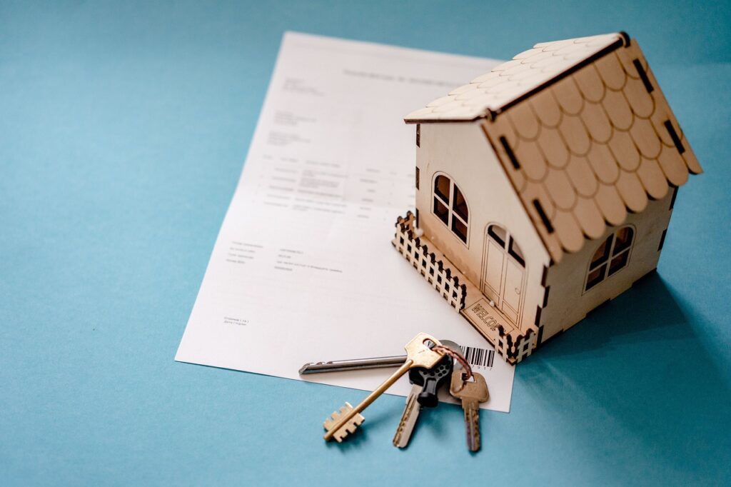 property with paperwork and keys, representing the lease extension process for buying or selling